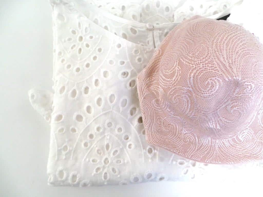 White broderie blouse with blush undercover slimming bra